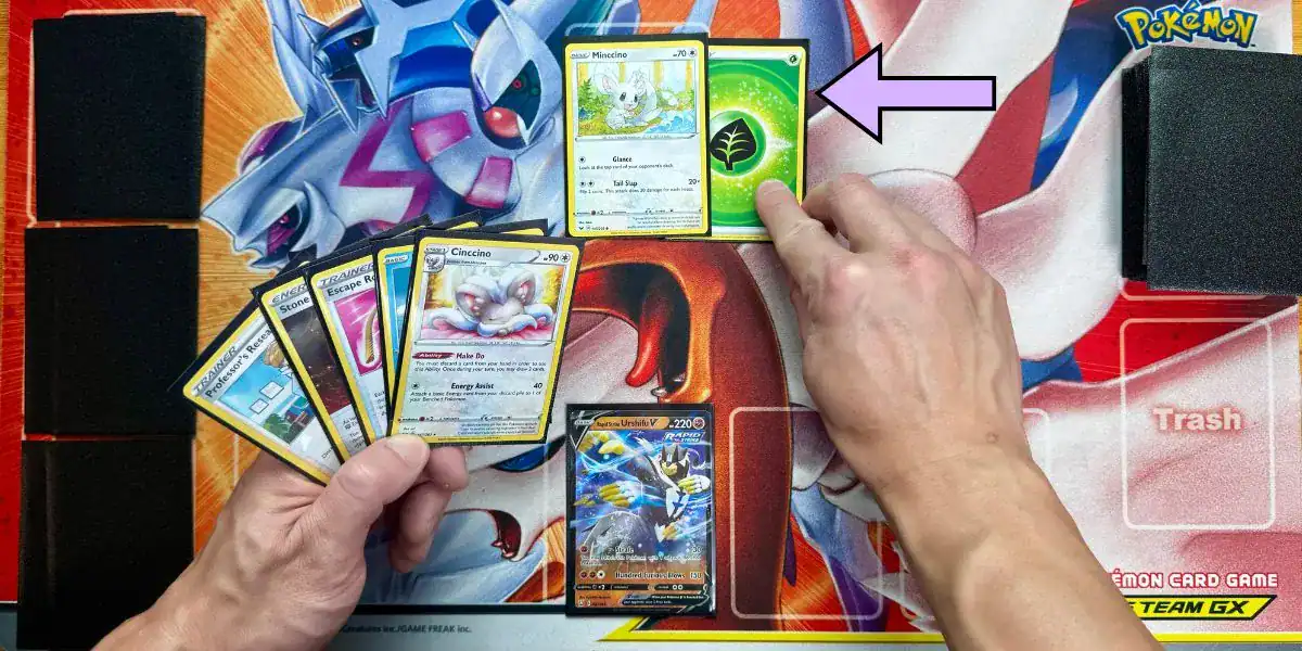 step-8-attach-energy-card the eighth step in playing pokemon cards is attaching energy